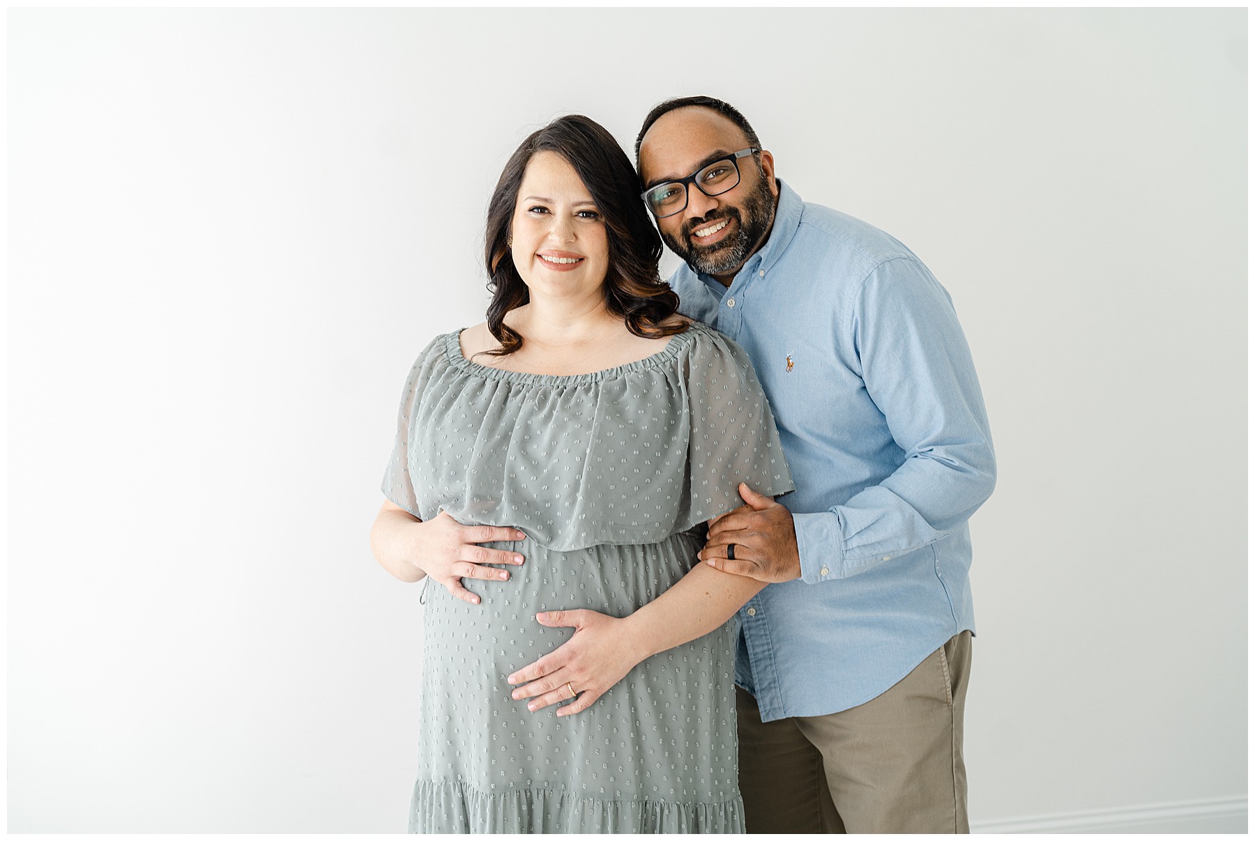 Portrait of a pregnant mother with her husband by Atlanta Maternity photographer.