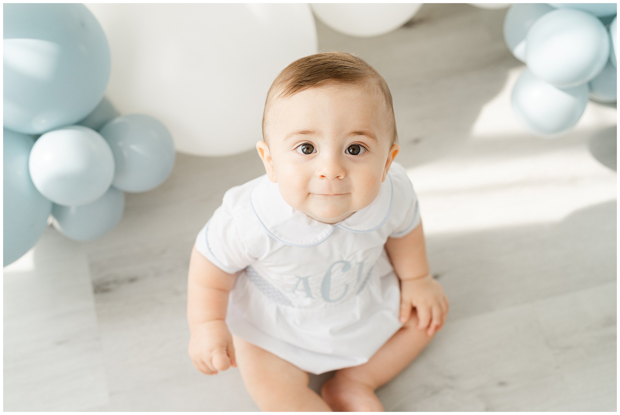 Portrait of a baby boy for his Atlanta first birthday photos and cake smash.